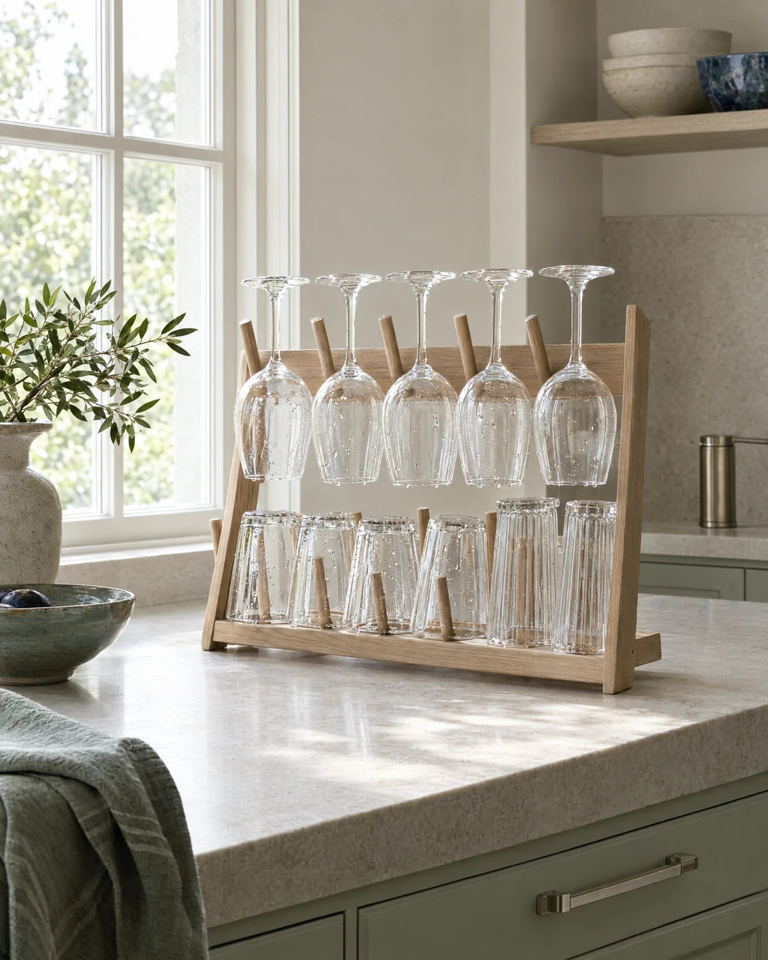 Spotless glasses drying by a bright window