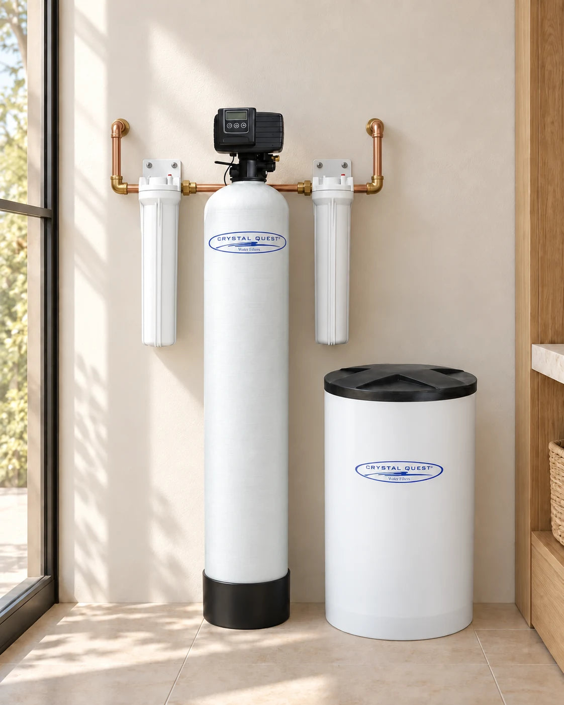 Whole House Water Softener: a resin tank, a brine tank and two filter housings in an illustrative utility room