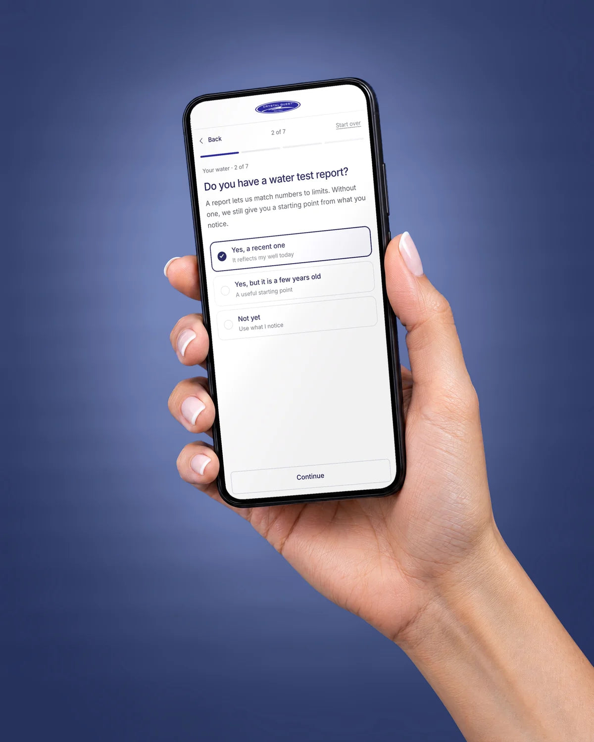 A hand holding a phone showing a water test question